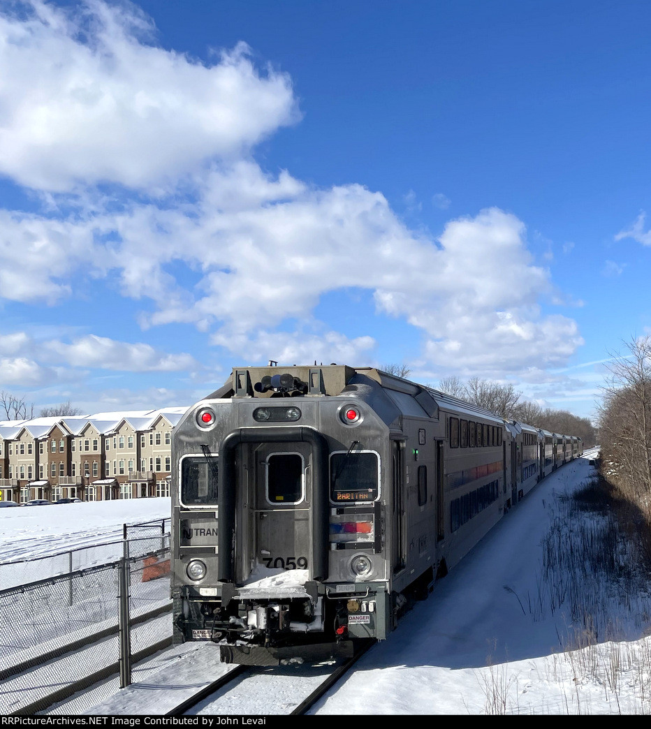 Multilevel Cab Car # 7059 bringing up the rear of NJT Train # 5517 as it heads away from Somerville Station toward the next and last stop of Raritan 